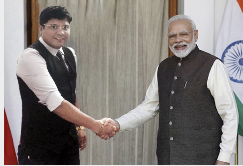 Company representative meeting with the Prime Minister of India