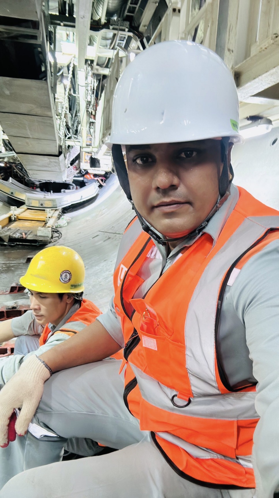 Engineer with site crew on the tunnel drive