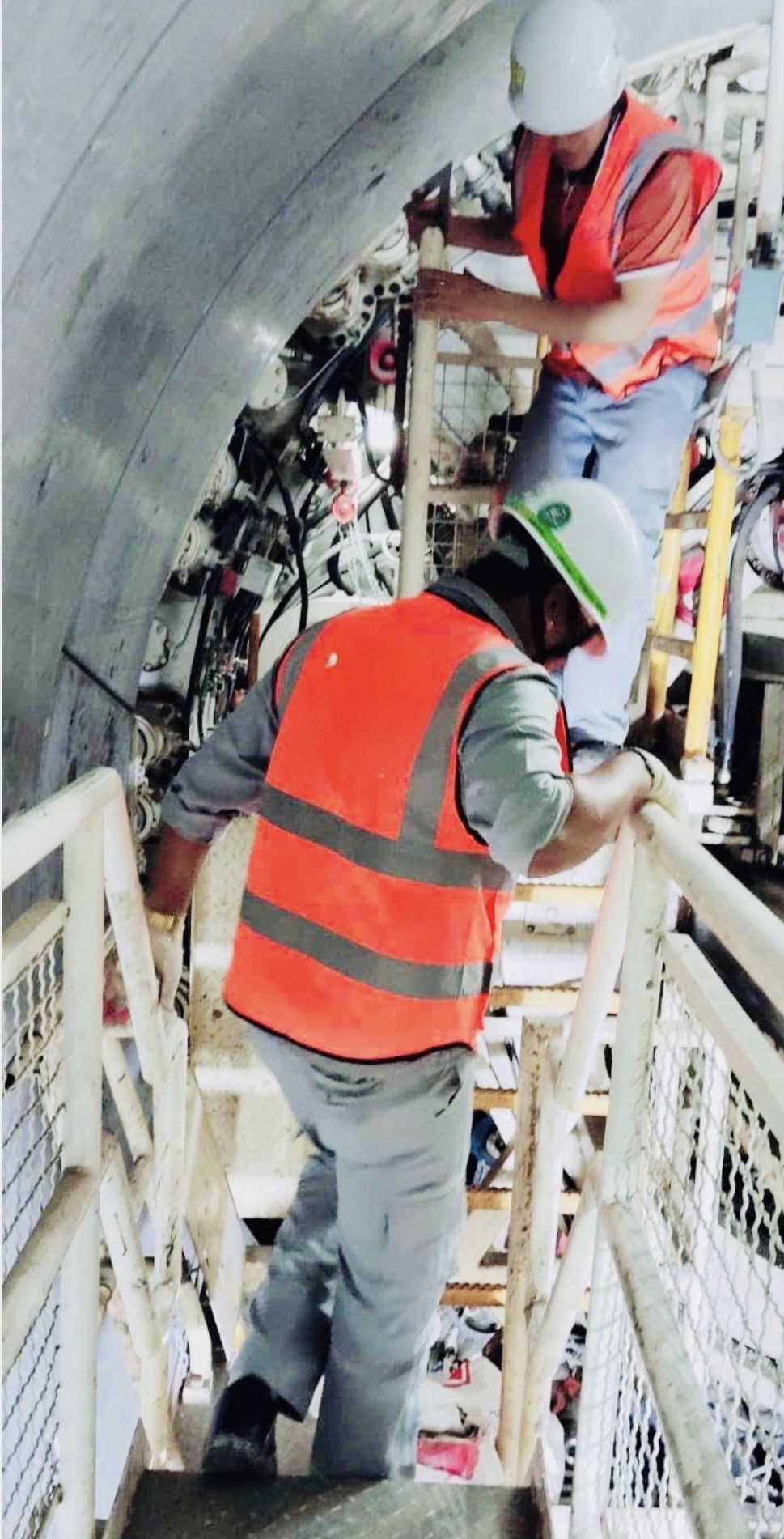 Site crew on TBM access platform